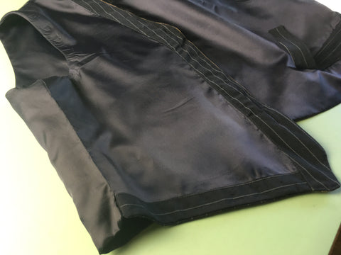 Photo of lining side seam hand-stitched closed
