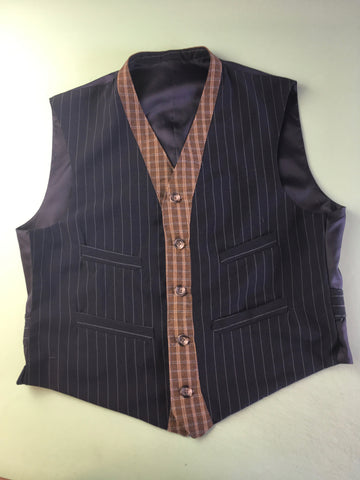 Photo of vest with buttons and buttonholes