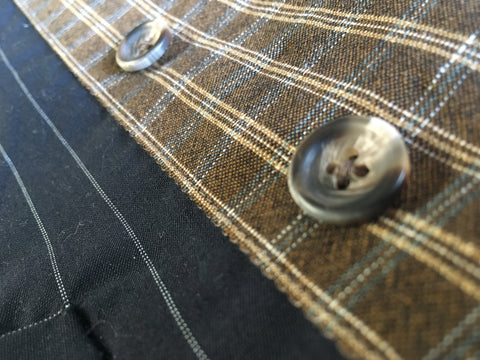 Photo of Buttons sewn to vest