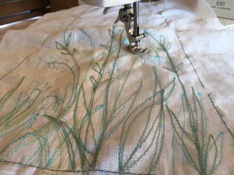 Photo third upclose of using the traced design to stitch the 213 pinafore design