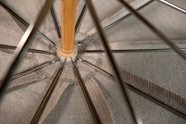 View of the pinked linen circle with the frame attached.