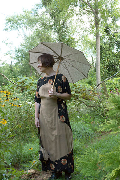 Photo of 261 Paris Promenade Dress and Parasol in garden