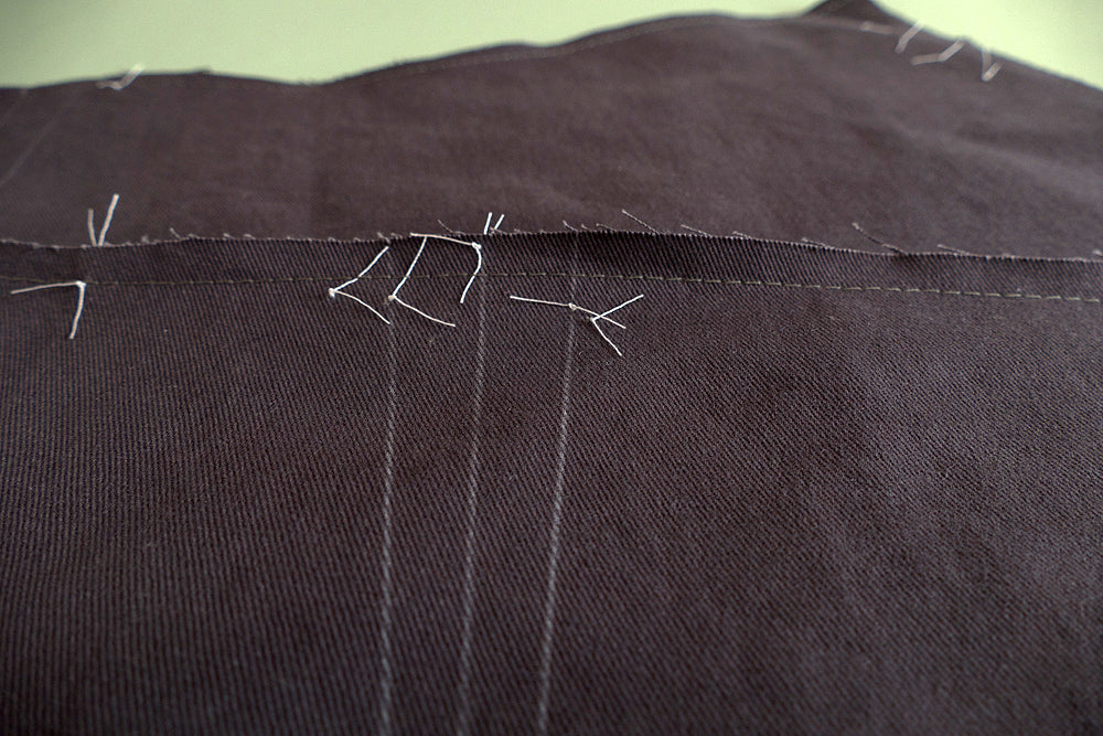 Up close photo of makings and tailor tacks of front of 229 Sailor pant