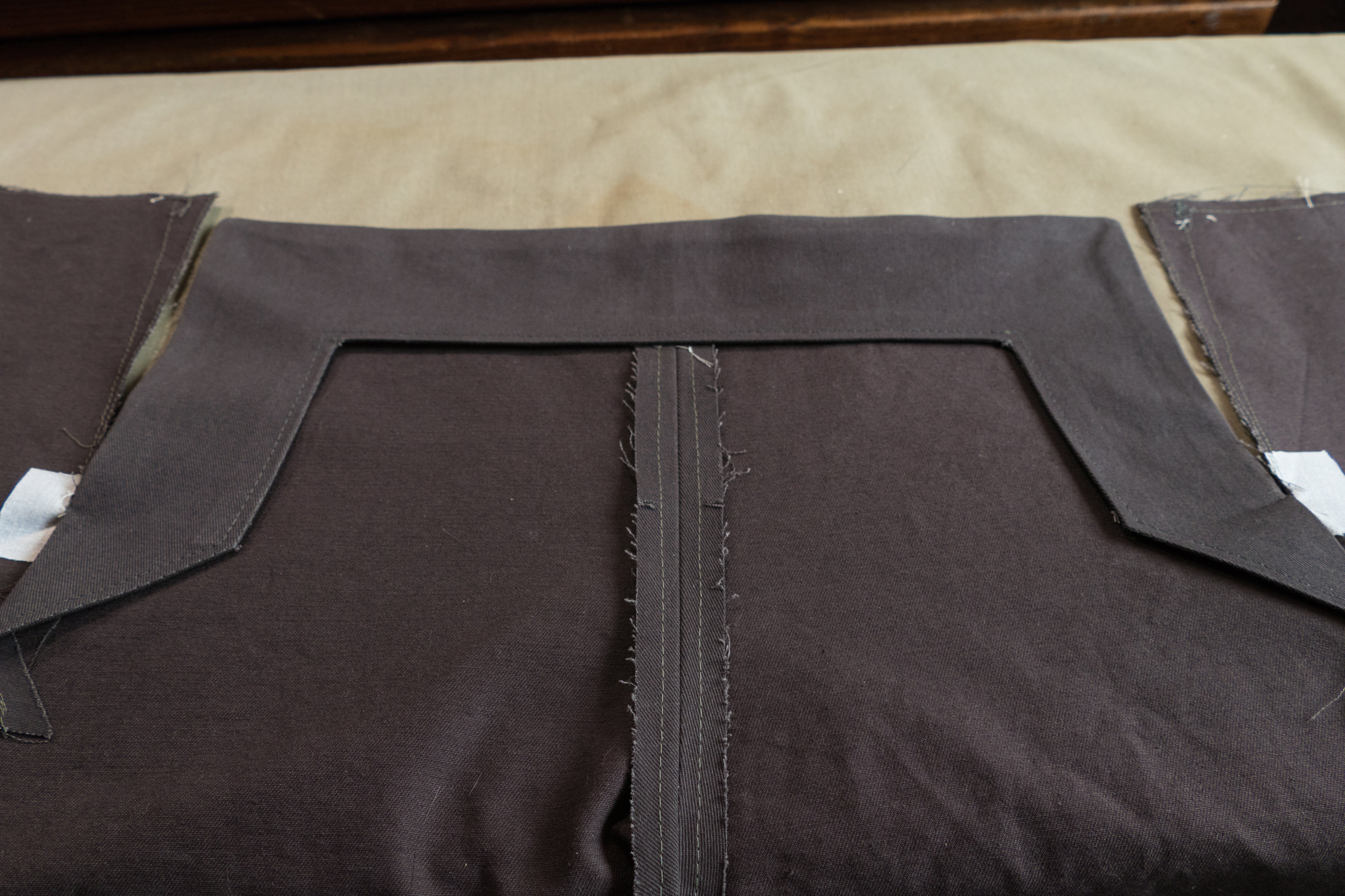 Front Buttonhole Facing turned to the inside of the pant.