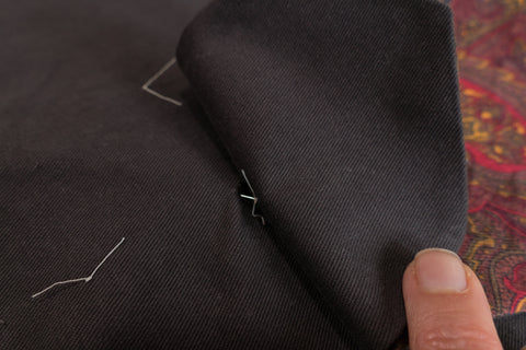 Using a pin align the dots at the bottom of the Front Dart Gusset and the pants.