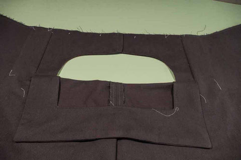 Front of the pant showing the Front Buttonhole Facing folded down revealing the Front Dart Gusset Facing.