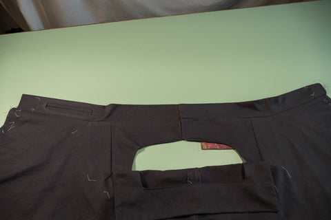 The outside of the pant with the Front Buttonhole Facing folded down.