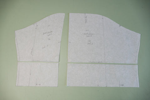 The front and back sleeve pattern pieces graded and cut.