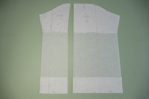 The sleeve pattern pieces separated to create a new longer sleeve pattern.