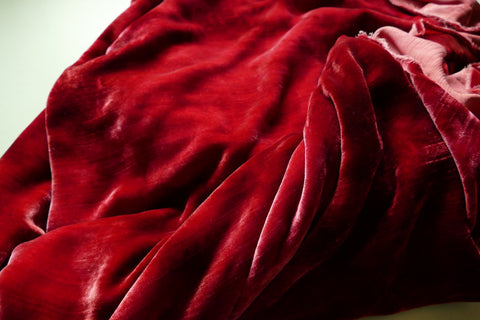 Red velvet fabric with arbitrary folds Stock Photo by ©fotofermer 6842108
