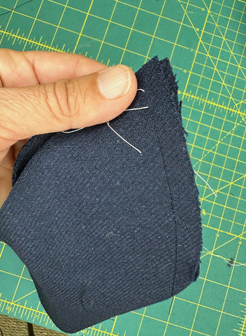 wool fabric with threads in it marking sewing line