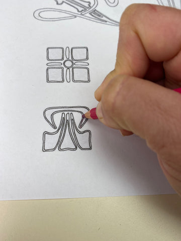 Tracing a design with transfer pencil