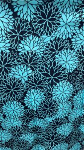 teal and black printed fabric