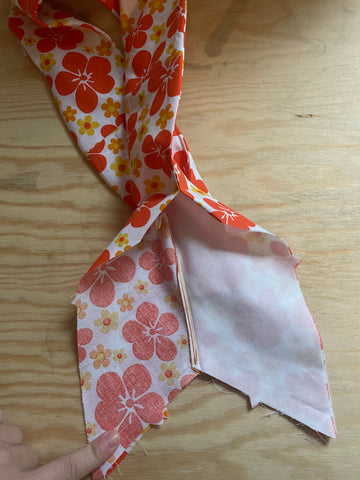 Yoke front assembly with "fish tail" for yoke with orange floral fabric.