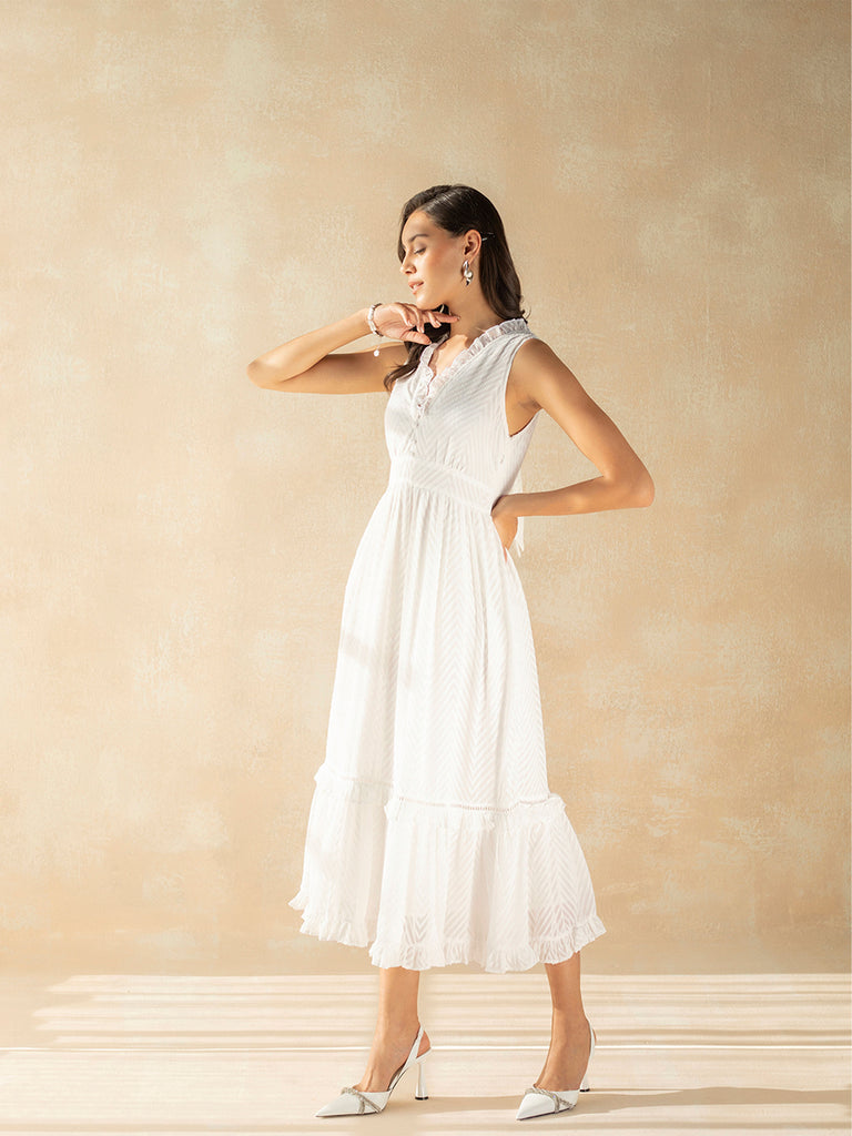 women in white maxi dress with footwear