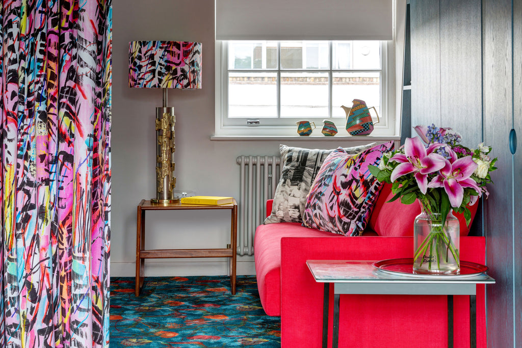 Vibrant and colourful home office and cinema room in a London townhouse