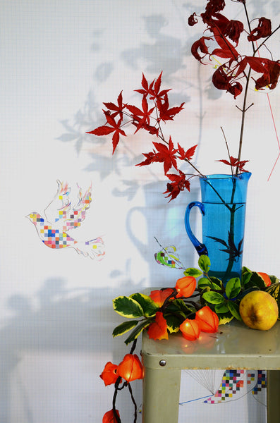 Autumn leaves and coloured glass