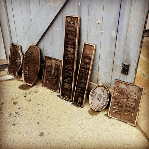 Chemical Treatment On Bronze House Signs