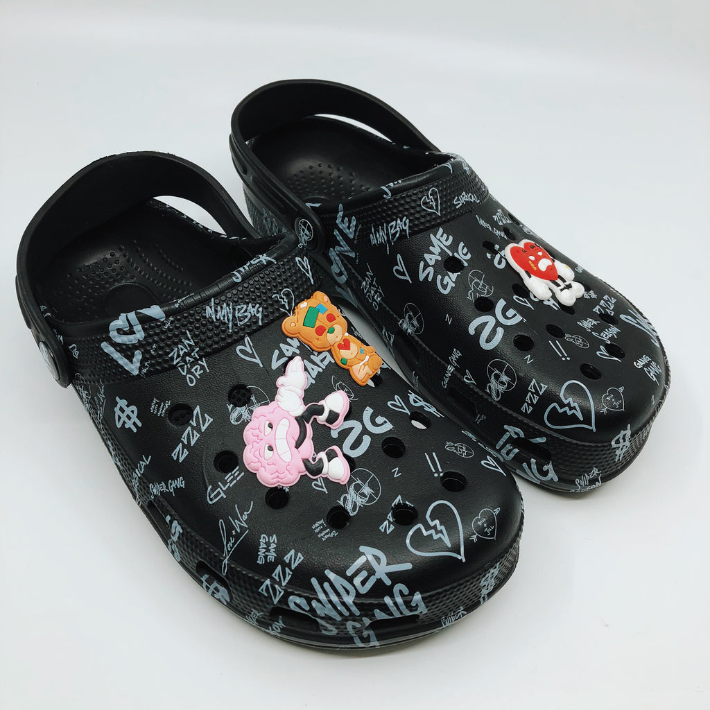 black crocs with charms