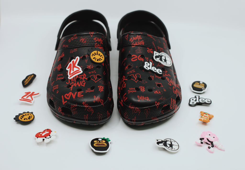 red crocs with charms