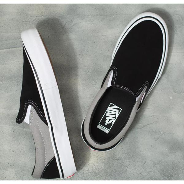 black and grey slip on vans