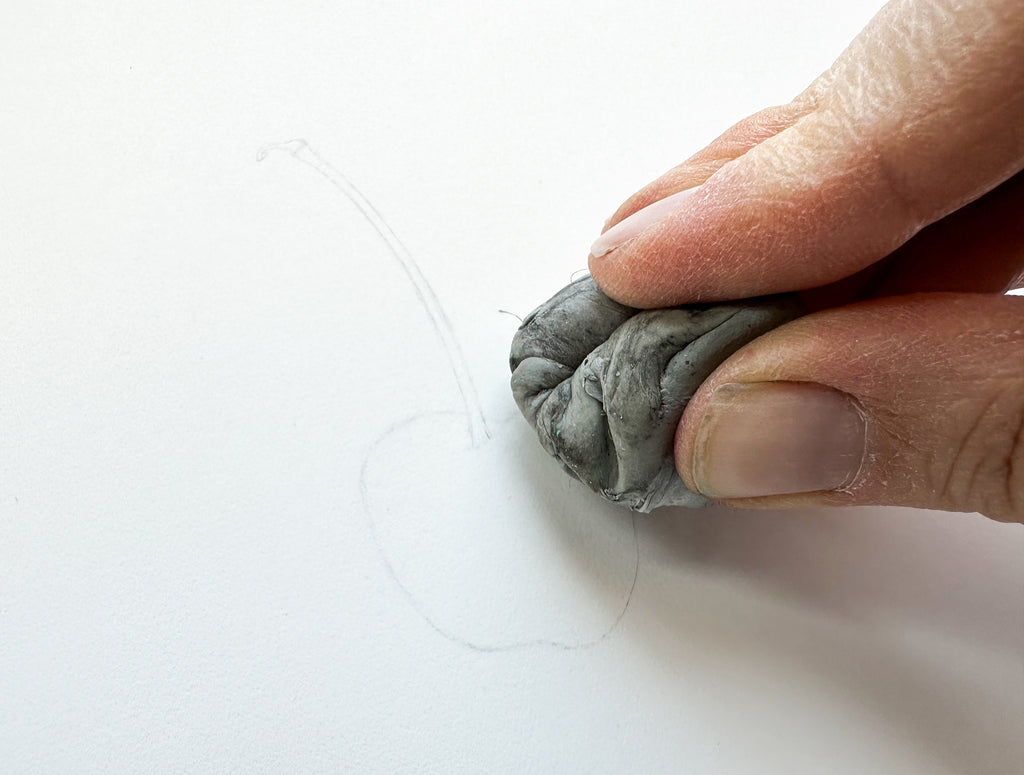 Use a kneaded eraser to lighten your drawing