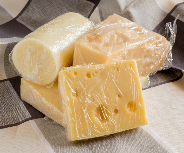 should you wrap cheese in plastic wrap?