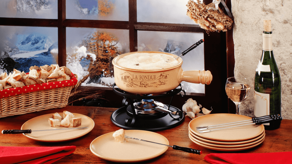 swiss fondue with alps in the background