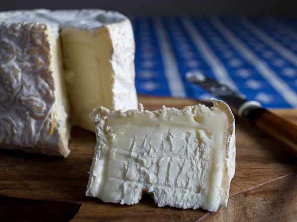 close up of the triple creme brie paste and rind