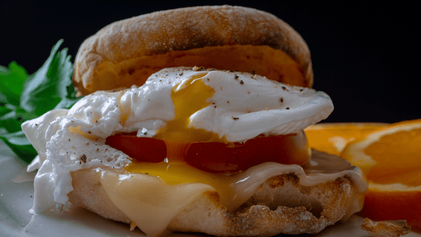 grilled egg and cheese on an english muffin