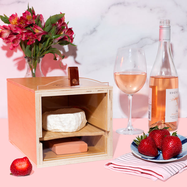 rose wine and cheese pairing with strawberries in a Cheese Grotto