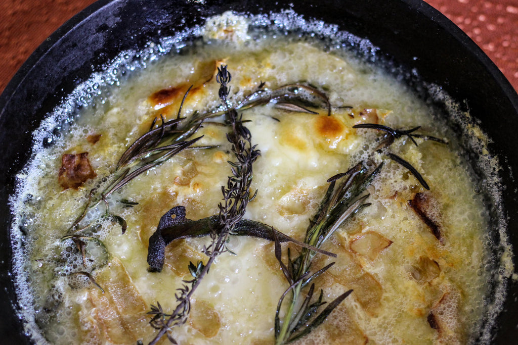 melted cheese with herbs