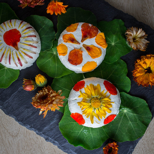 goat cheese with fresh edible flowers