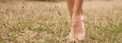 grounding feet on grass