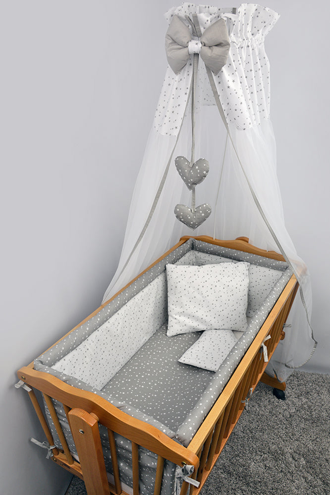 swinging crib bedding