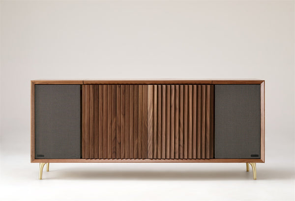 The Standard in North American Walnut with metal weave speaker grilles and brass legs.