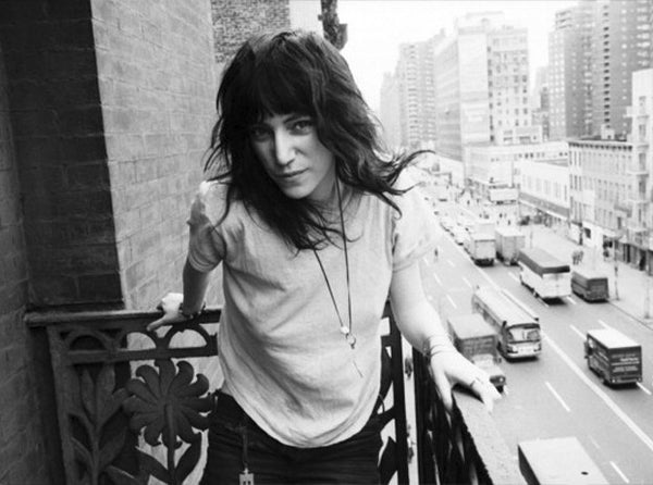 Patti Smith on a balcony at the Chelsea Courtesy of The Chelsea Hotel website