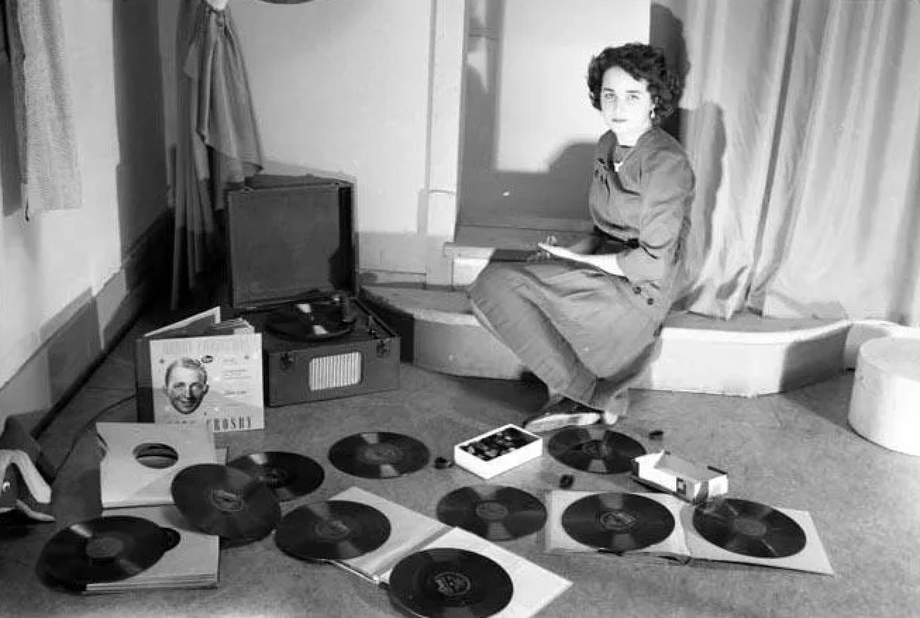 Vintage photo of woman with vinyl records