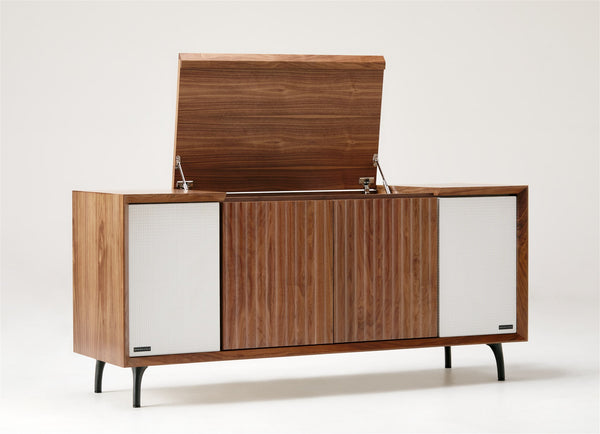 The Standard in North American Walnut with white speaker grilles and black anodized legs.