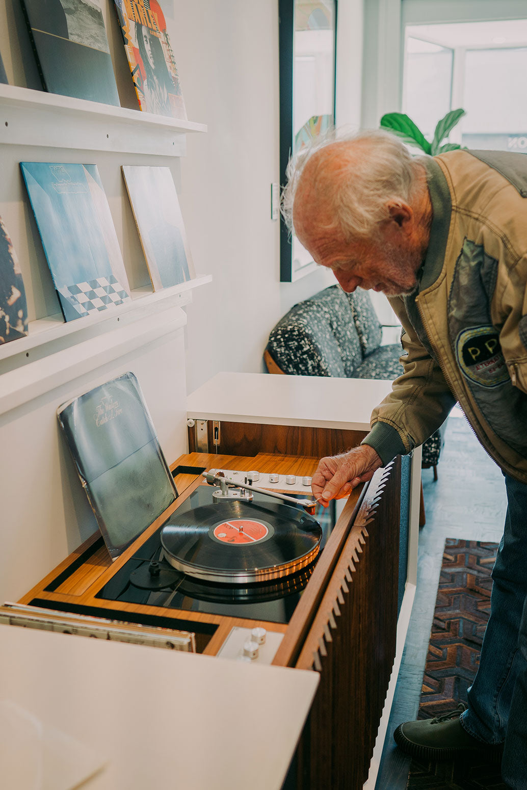 Chris Blackwell puts the needle on a record
