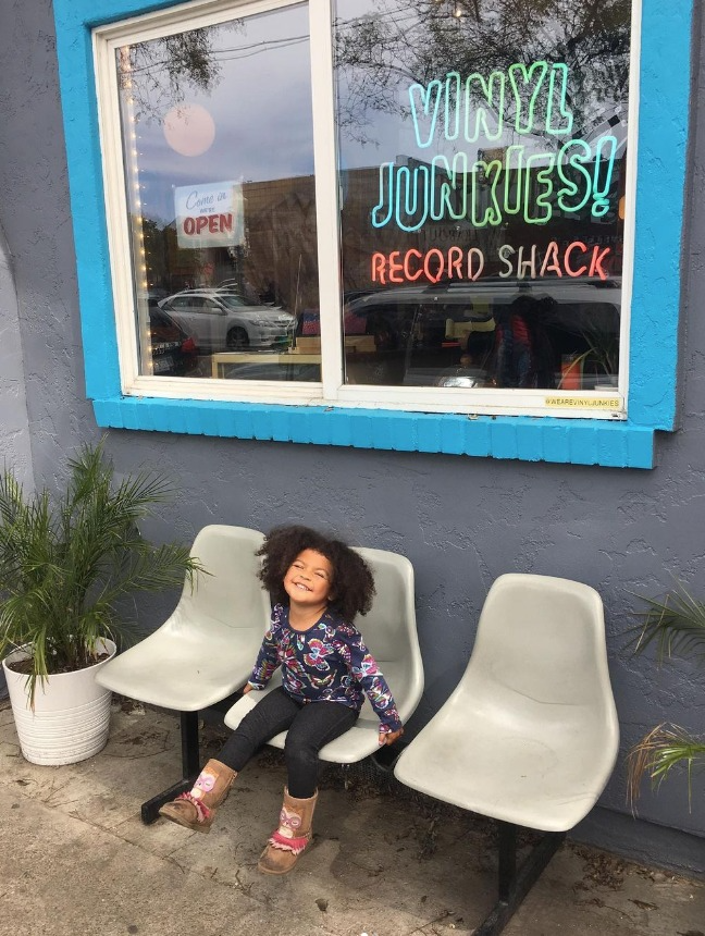 Local shopper Alyana in front of the store