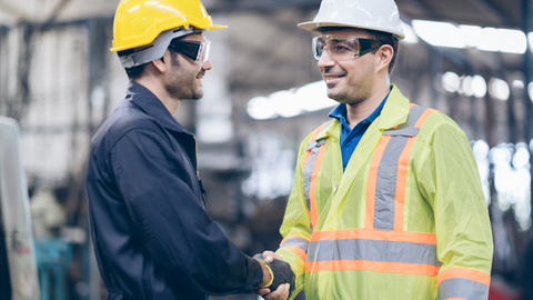 two-men-in-high-visibility-clothing