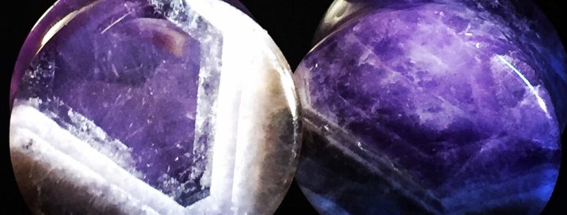 a pair of amethyst stone plugs