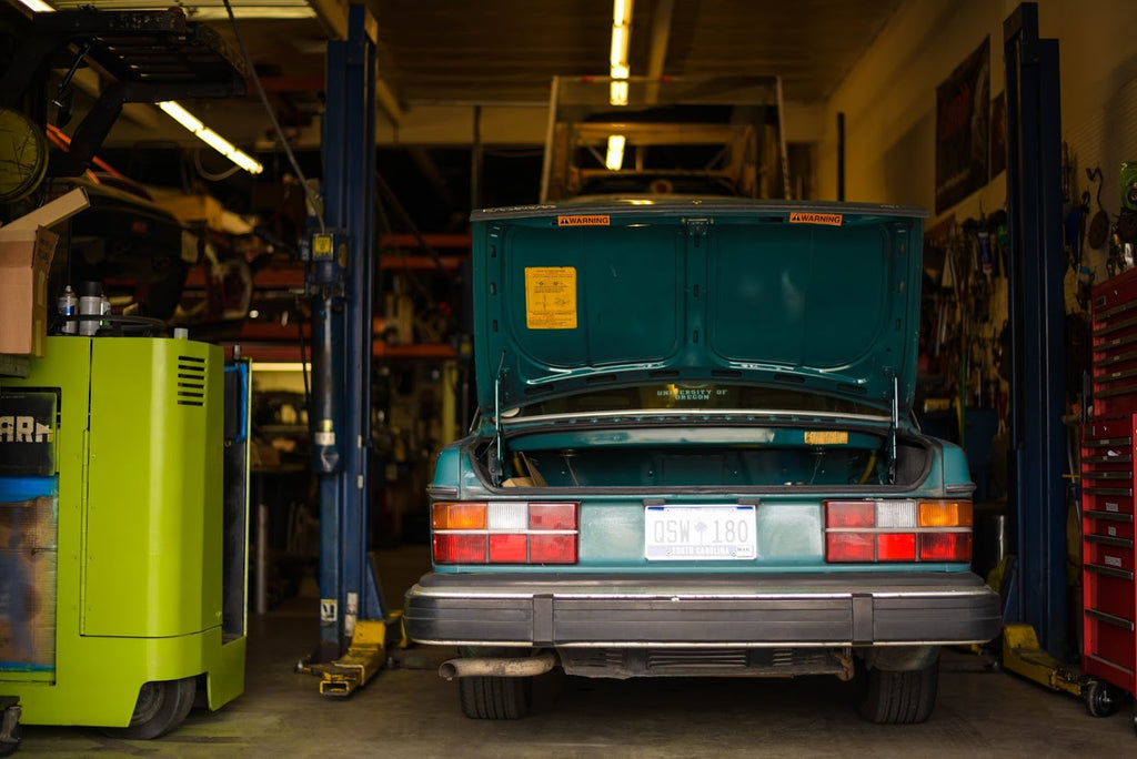 Volvo 240 rear view in workshop