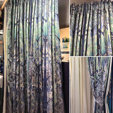 Custom forest tree full length curtains in teals and blues.