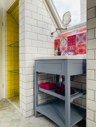 Brightly coloured pop tile mix in bathroom