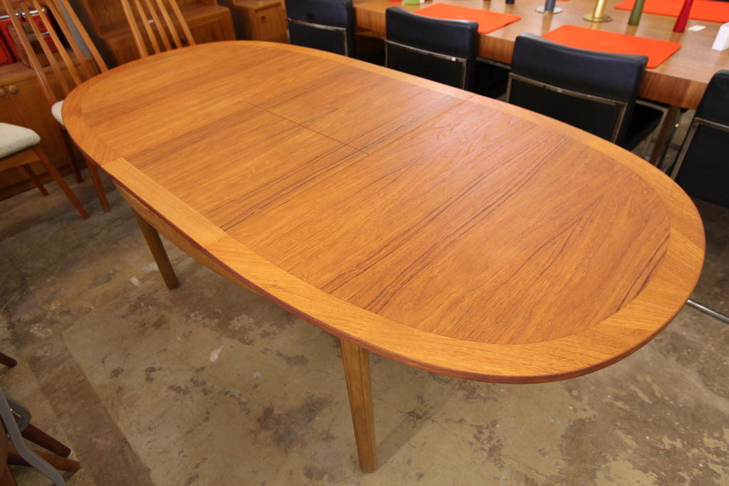 oval butterfly leaf dining table