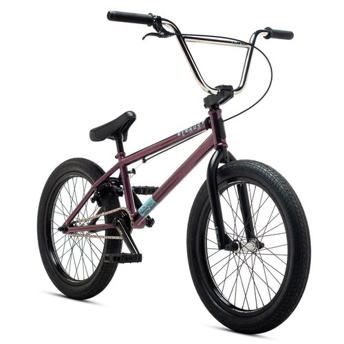 white and purple bmx bikes