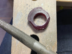 Carving the ring using a wax file