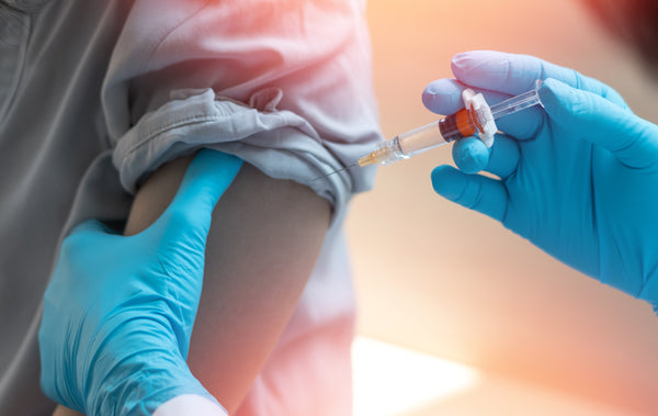 patient receiving covid vaccine